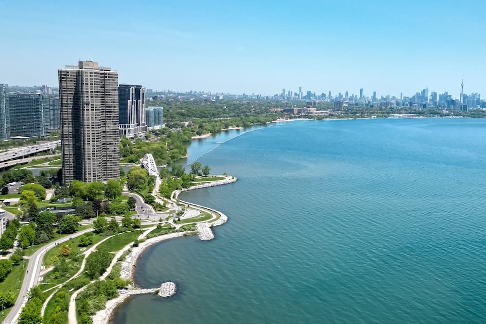 Toronto Skyline at Etobicoke Lakeshore: A Breathtaking Aerial View of the Vibrant Cityscape Reflecting on the Tranquil Waters of Lake Ontario.